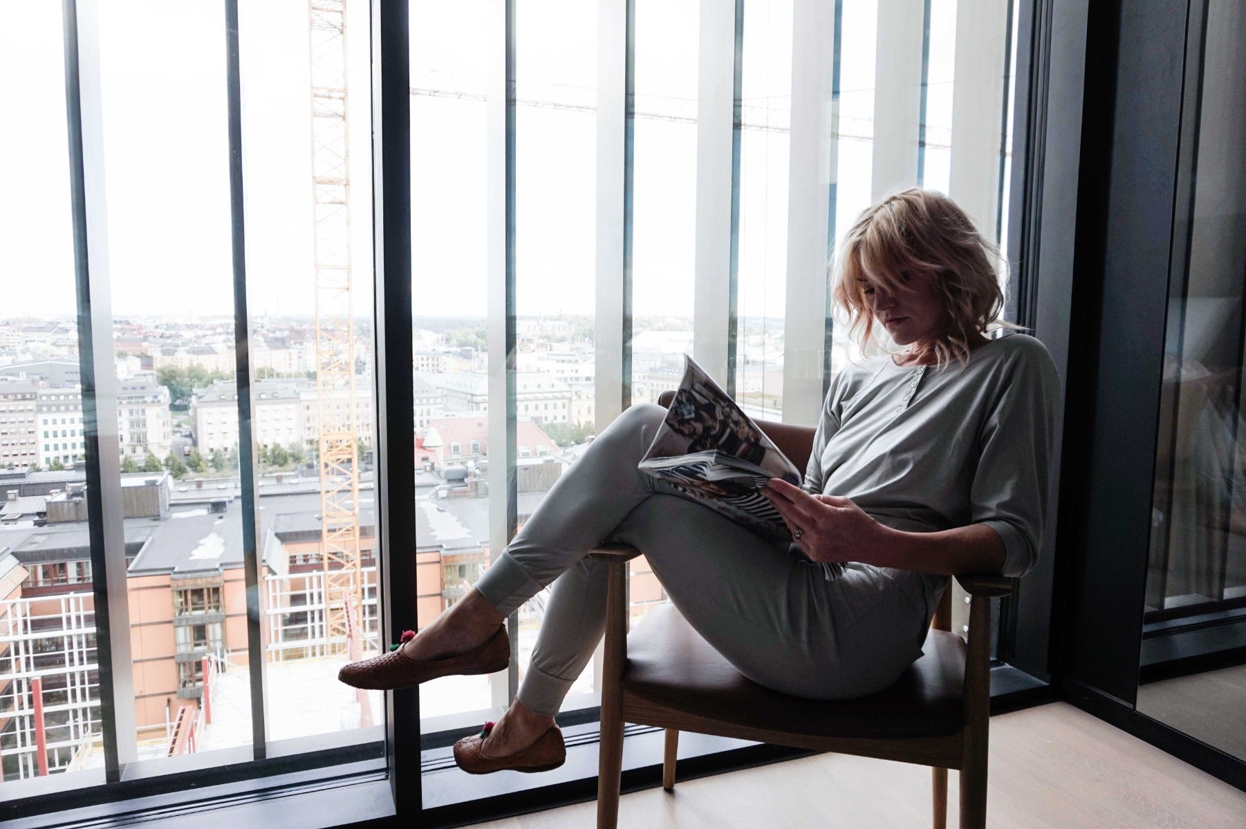 Women wearing pyjamas in light grey from The Sleepy Collection