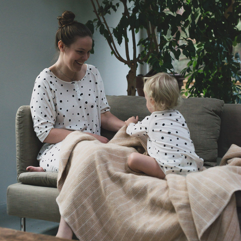 Mother and son, matching in dotted nighties from The Sleepy Collection. Photo by Beatrice Garvey
