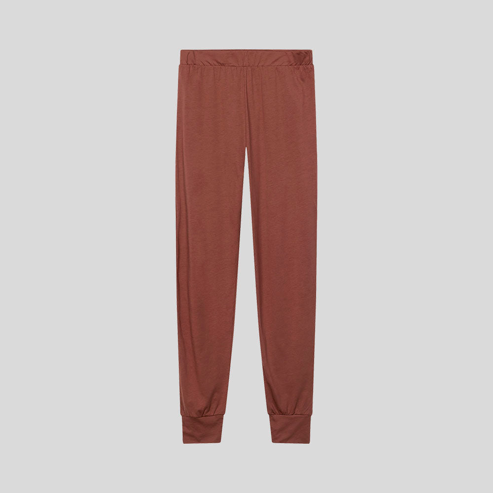 Women's PJ pants in color rust (terracotta brown). Classic design, consciously created from 100% organic Pima cotton. 